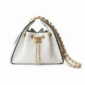 Chanel Quilted Leather Drawstring Bucket Crossbody